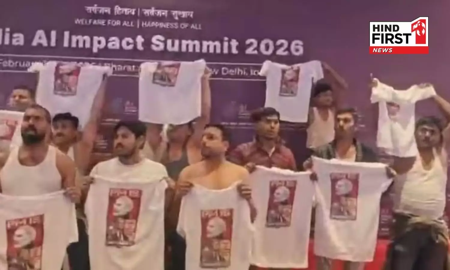 Chaos at AI Summit: Youth Congress workers take off their T-shirts to protest against the trade deal Chaos at AI Summit: Youth Congress workers take off their T-shirts to protest against the trade deal