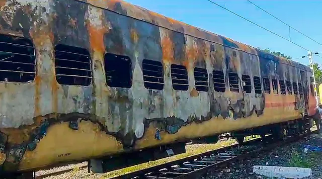 a fire broke out in a tourist train parked on Bodi Lane at Madurai railway station in the early hours of Saturday, killing ten people and injuring more than 20.