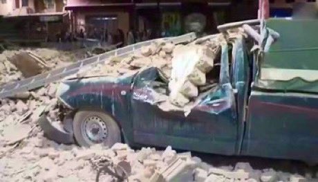 Building debris over car