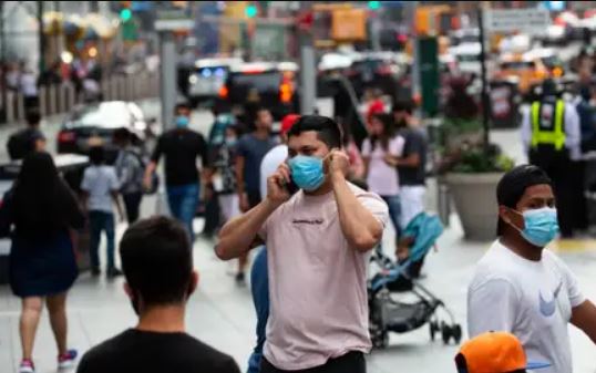 Representative Image of people wearing mask. 