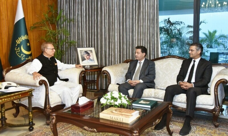 Attorney General for Pakistan Mansoor Usman Awan (right) and Chief Election Commissioner Sikander Sultan Raja (middle) called on President Arif Alvi on Thursday. — APP